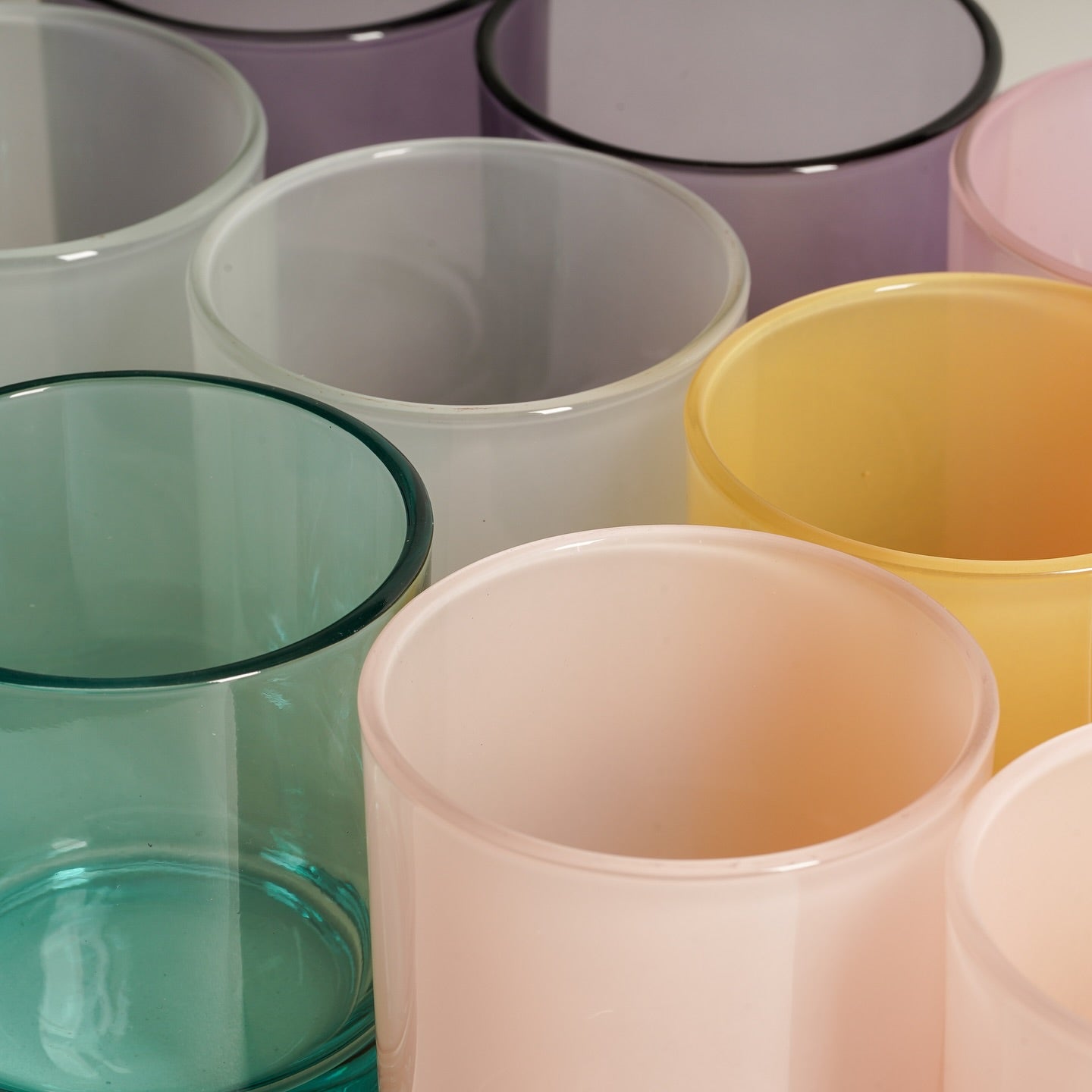 candle vessels in bright colors