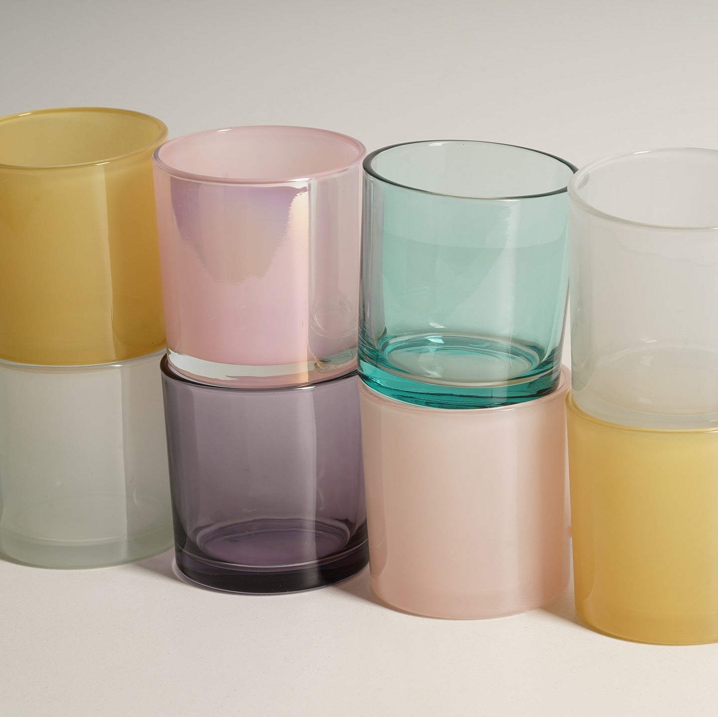 candle vessels in bright colors