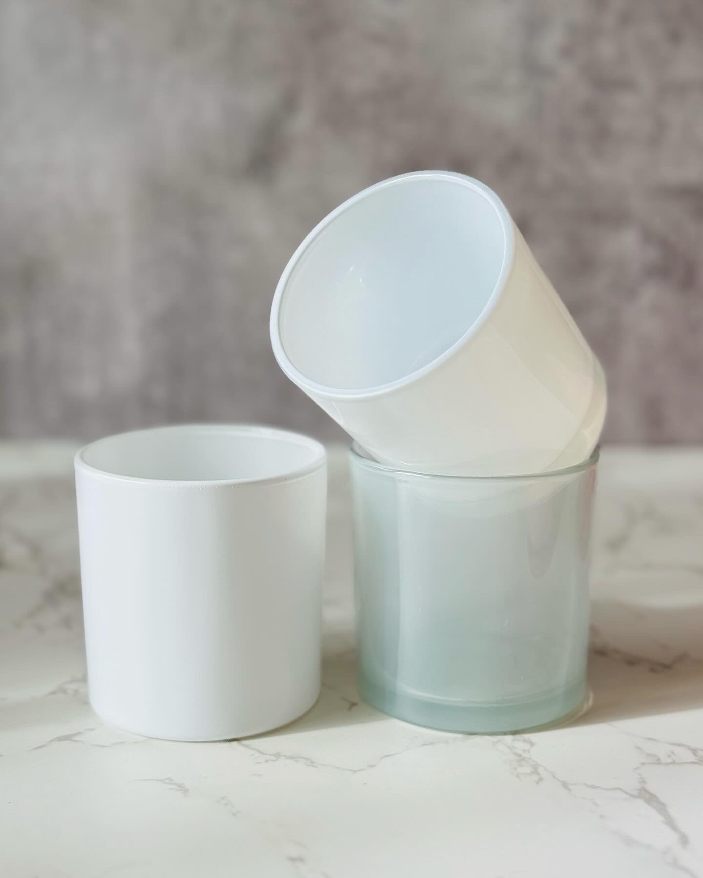 white candle vessels