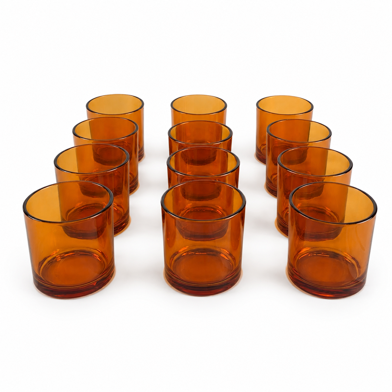 Translucent pumpkin orange candle jar for fall candle collections