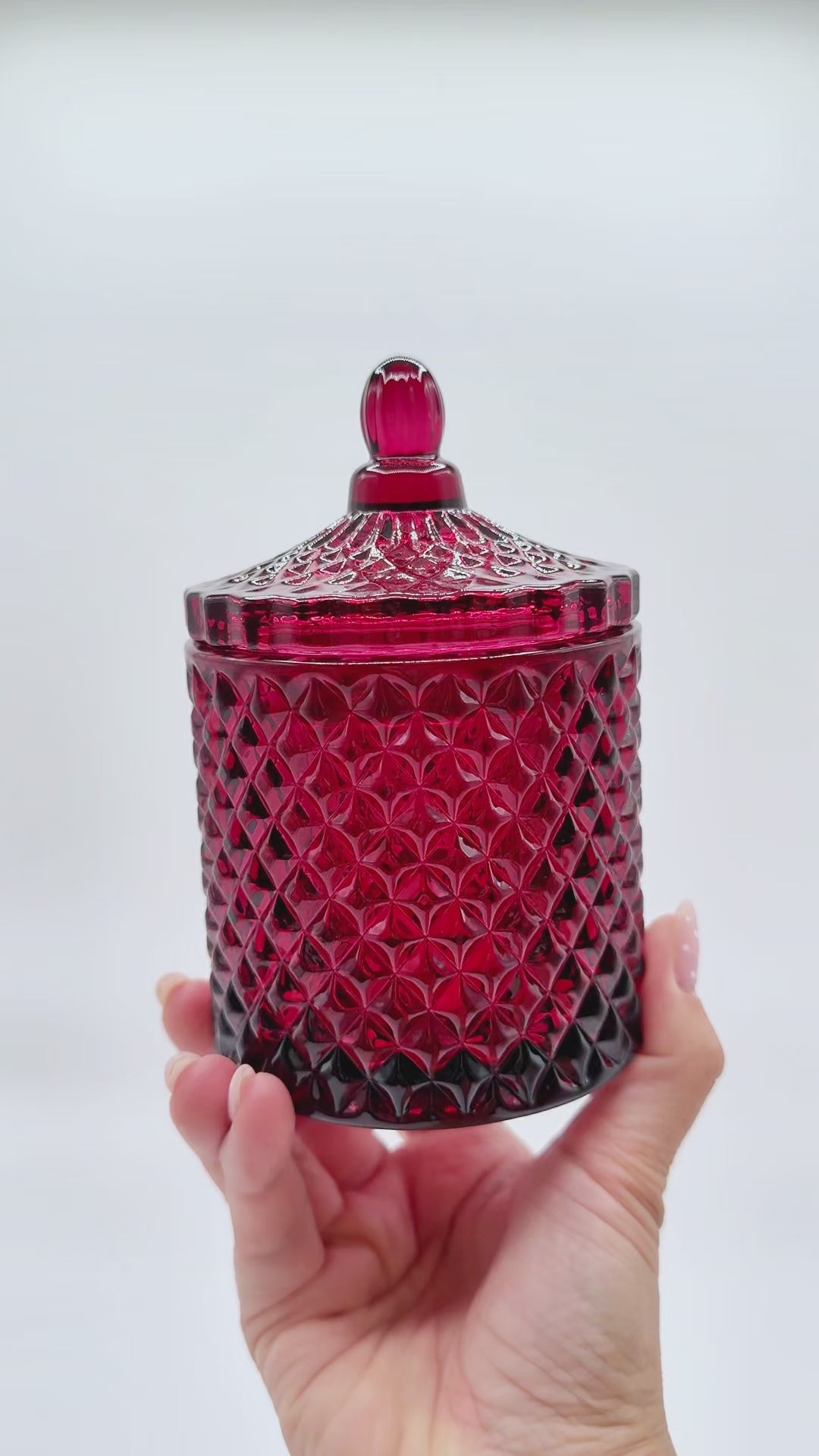 ruby glossy candle jar with a lid