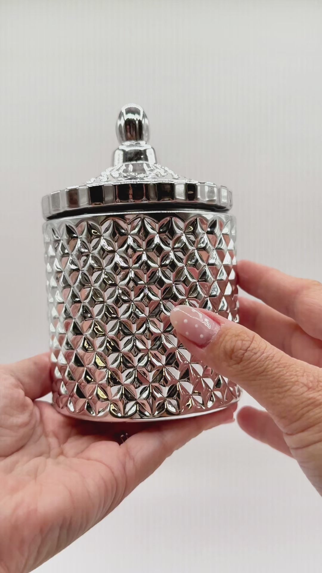 metallic silver candle vessels