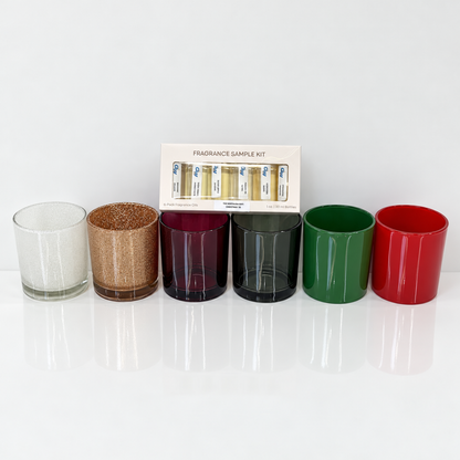 Christmas ’95 fragrance oil set displayed with six colorful Havana candle jars