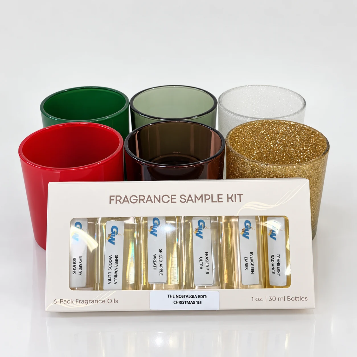 Six Monticiano candle jars with the Christmas ’95 holiday fragrance oil set