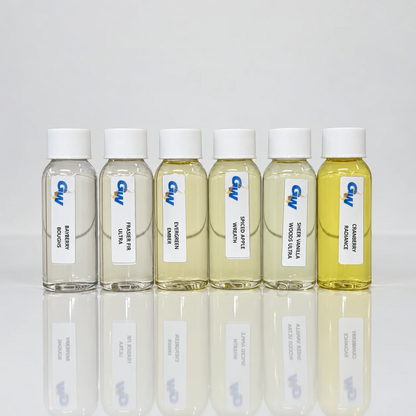 Six Christmas ’95 holiday candle fragrance oil bottles