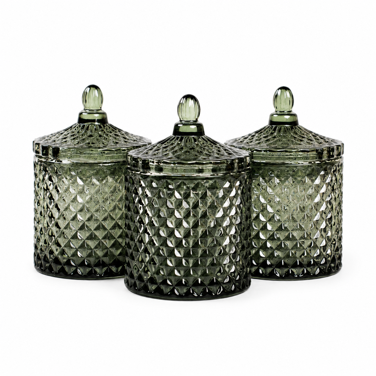 Green embossed glass candle jar with matching lid for soy candles