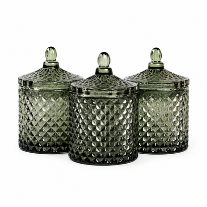 Green embossed glass candle jar with matching lid for soy candles
