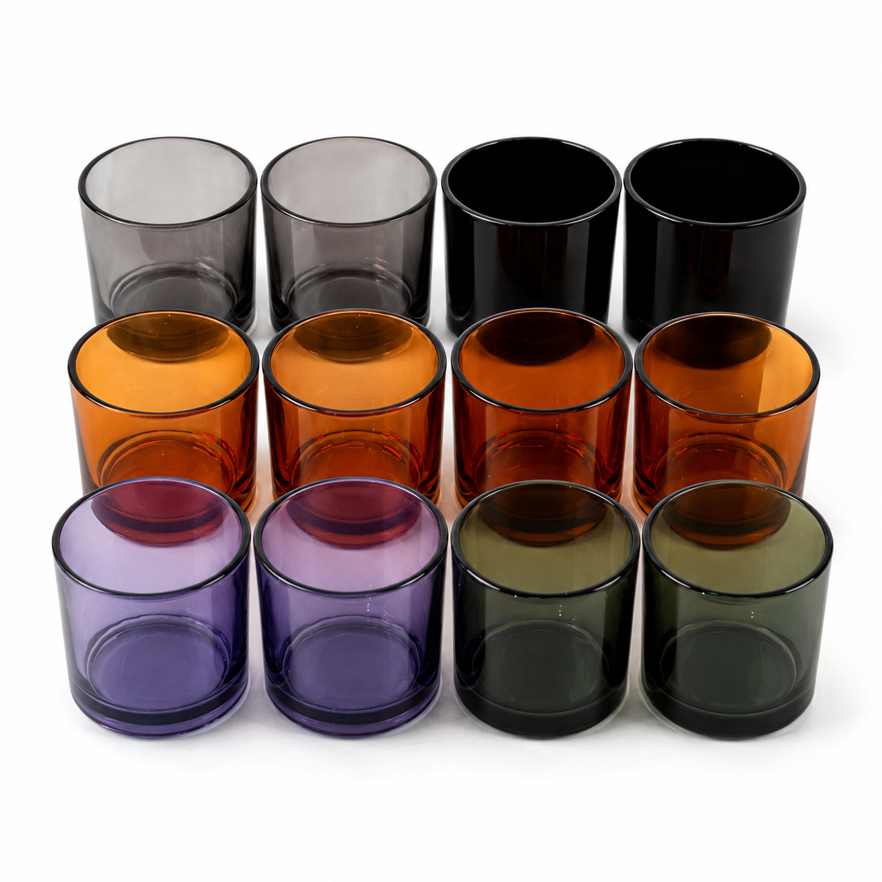 Monticiano glass candle jars in a dark seasonal color palette